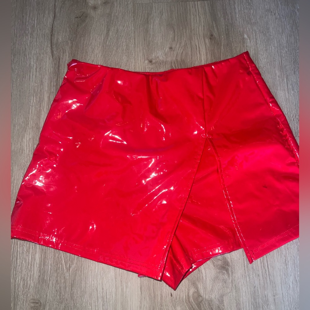 Red leather skort, size small. Sexy and fun!!
